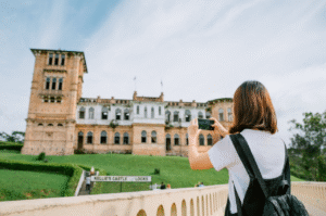 things to do in ipoh a woman capturing breathtaking image of kellies castle in ipoh